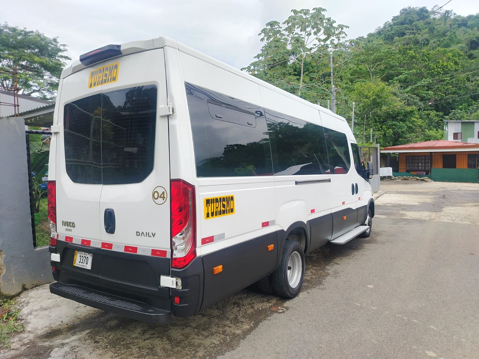 Rear side view of the Lora Rentals tourism van
